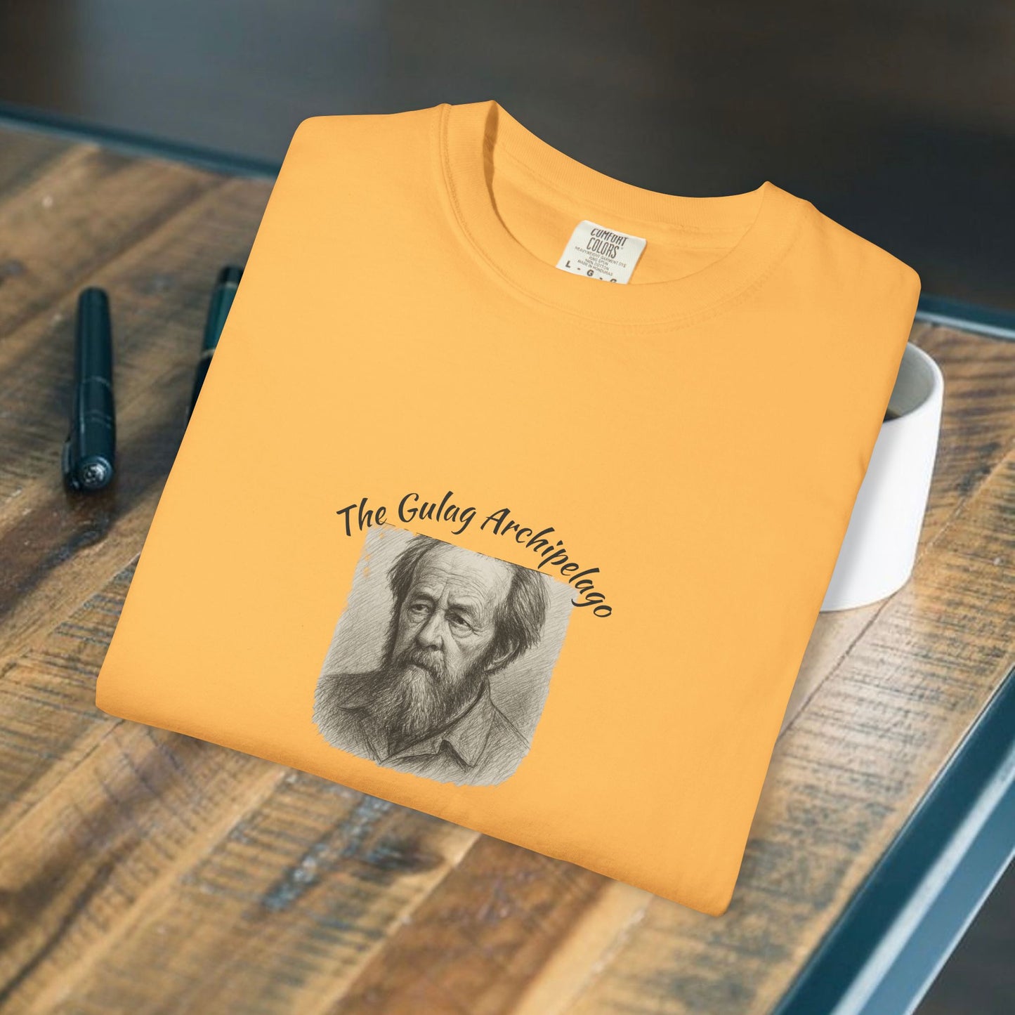 T-Shirt with image of Aleksandr Solzhenitsyn and words Gulag Archipelago on the front.