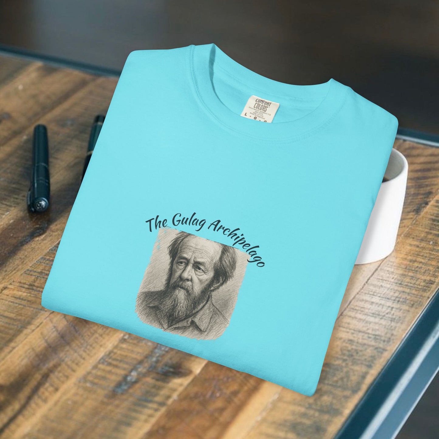 T-Shirt with image of Aleksandr Solzhenitsyn and words Gulag Archipelago on the front.
