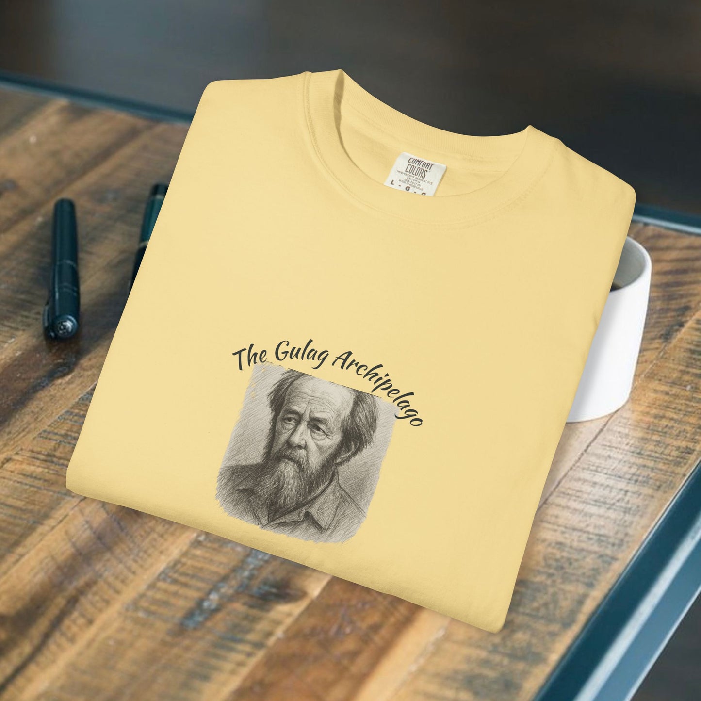 T-Shirt with image of Aleksandr Solzhenitsyn and words Gulag Archipelago on the front.