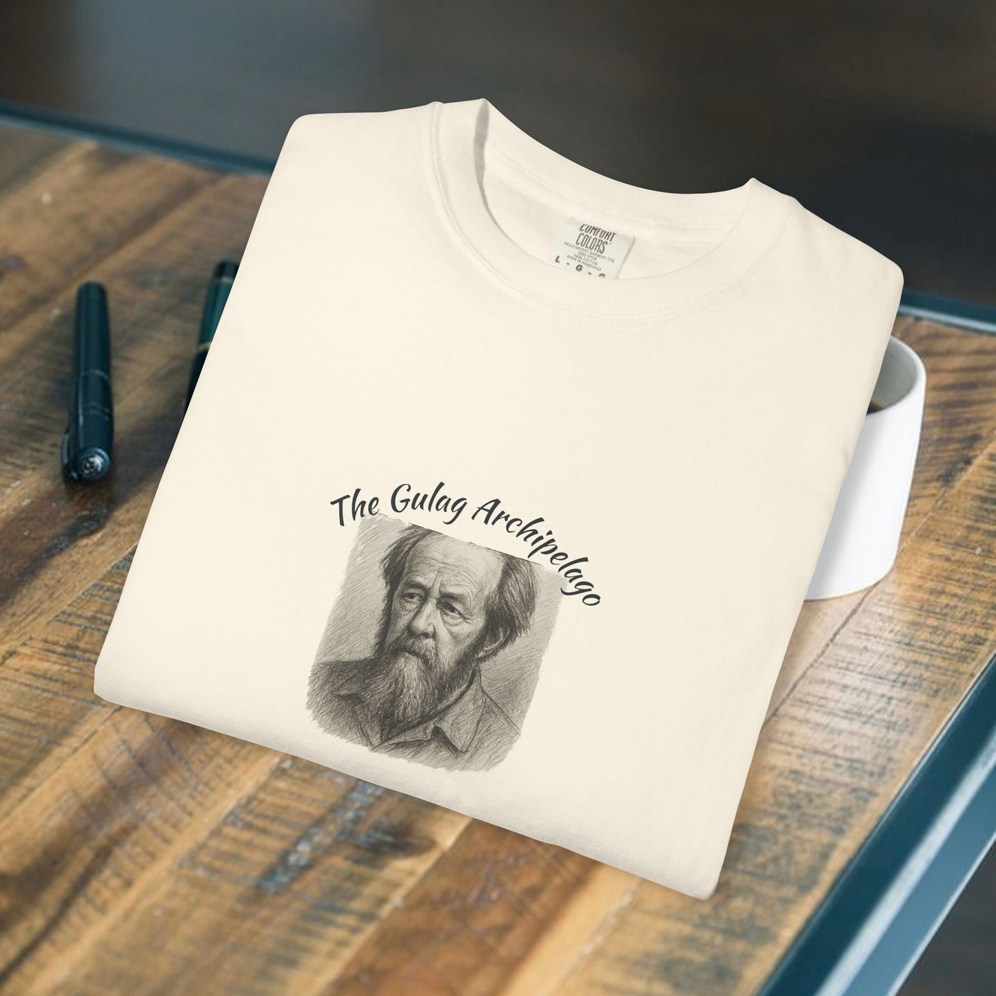 T-Shirt with image of Aleksandr Solzhenitsyn and words Gulag Archipelago on the front.