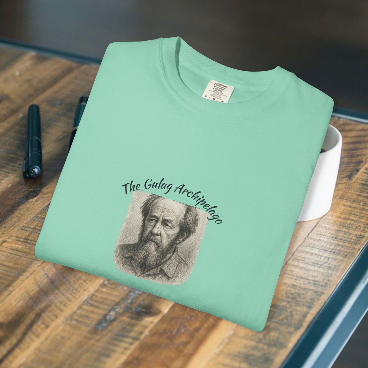 T-Shirt with image of Aleksandr Solzhenitsyn and words Gulag Archipelago on the front.
