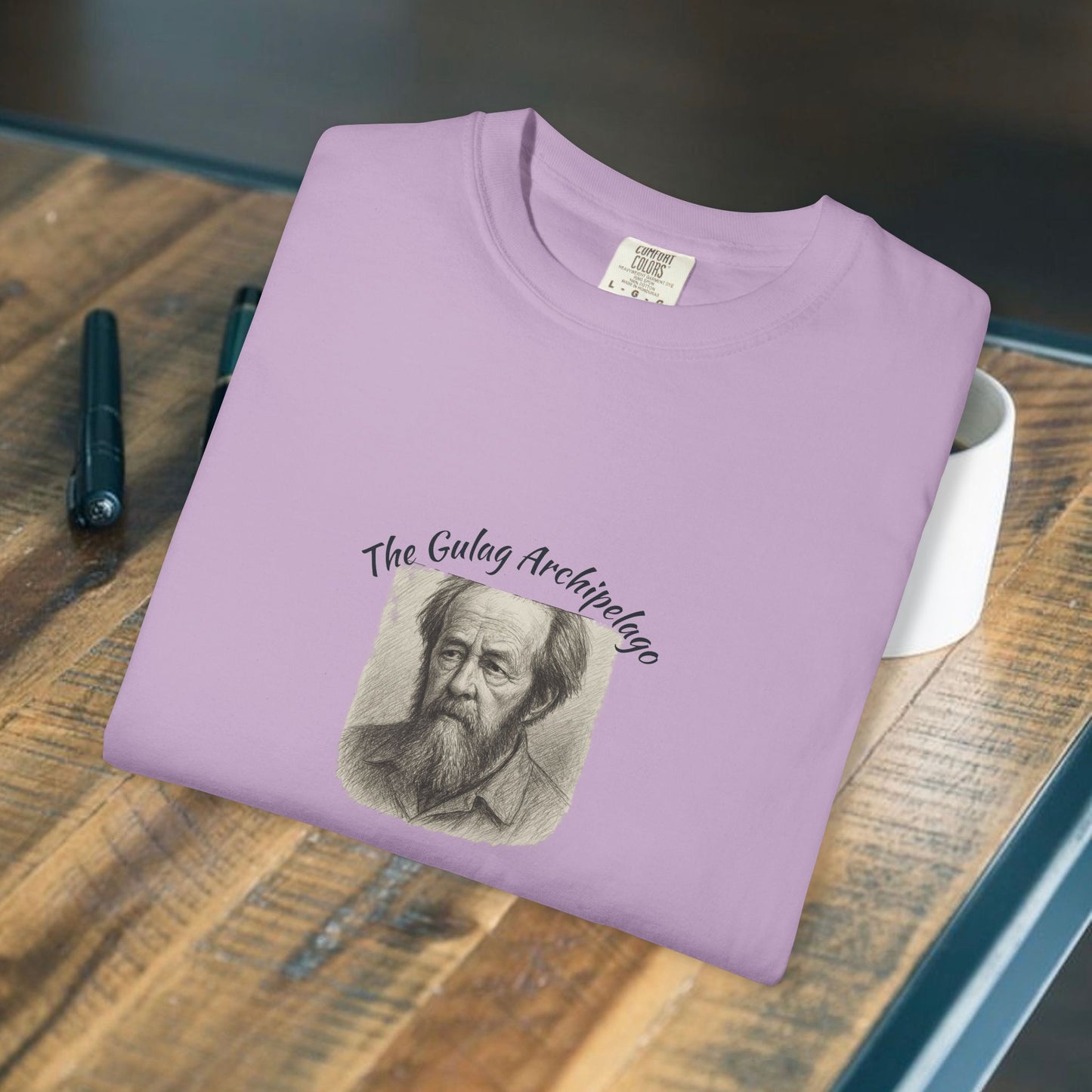 T-Shirt with image of Aleksandr Solzhenitsyn and words Gulag Archipelago on the front.
