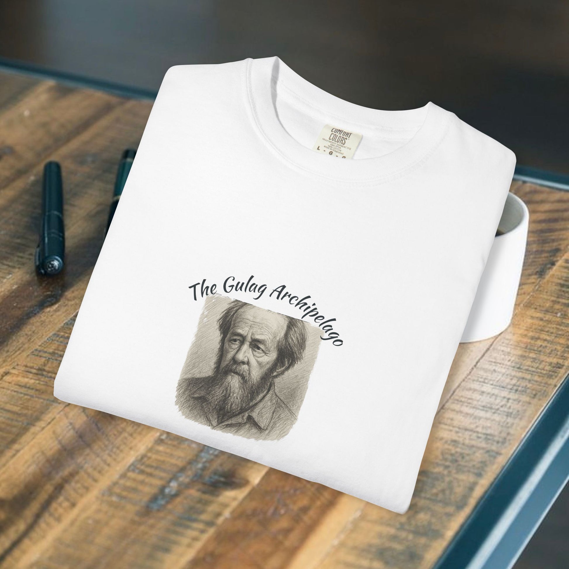 T-Shirt with image of Aleksandr Solzhenitsyn and words Gulag Archipelago on the front.